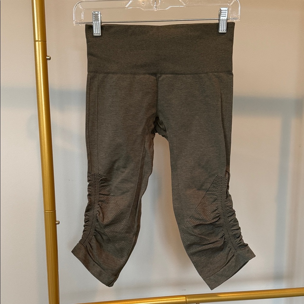 LULULEMON Ebb to Street Crop 21” olive green